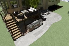 Back yard with a deck and concrete patio and outdoor kitchen
