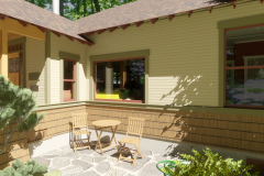 exterior view of bungalow with lap siding and shingle walls, red windows, flagstone patio with cafe seating