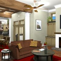 Cozy living room with exposed beams and open to the kitchen and dining room.