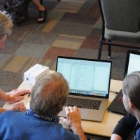 Chief Architect customer receiving one on one instruction on the home design software at the 2017 Chief Academy in Coeur d'Alene, Idaho.