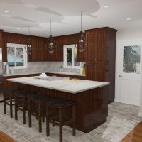 L-shaped kitchen design with glass pendants and large eat-at island.