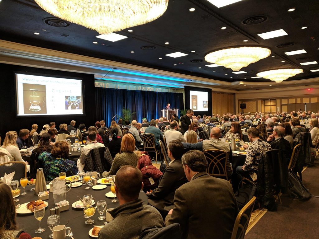 Customers sitting down listening to Greg Wells at the Chief Architect User Breakfast