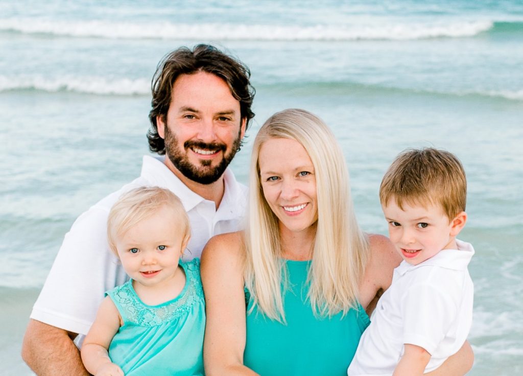 Nathan and his family at the beach