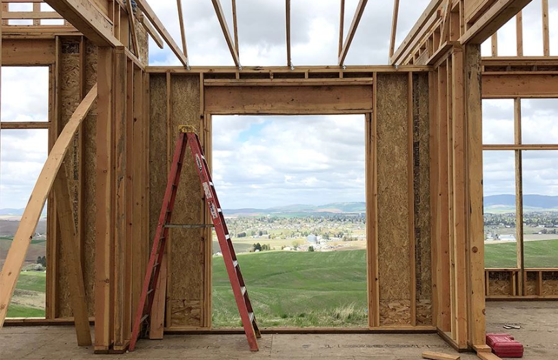 View of prarie from unfinished framed house