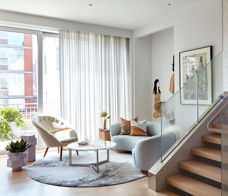 Feminine colors and soft shapes are a feature in this Chelsea NYC Triplex designed by INC Architecture & Design