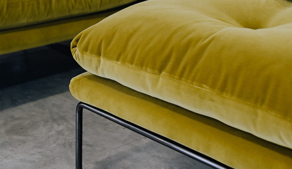 A contemporary Italian sofa in a bright pear green velvet.