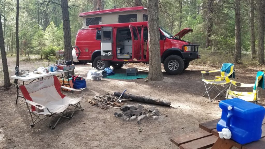 Camper van and camp fully set up.