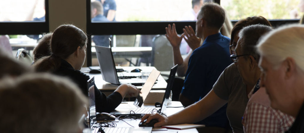 Multiple computers at a Chief Architect event.